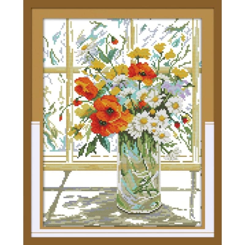 Flower vase on windowsill