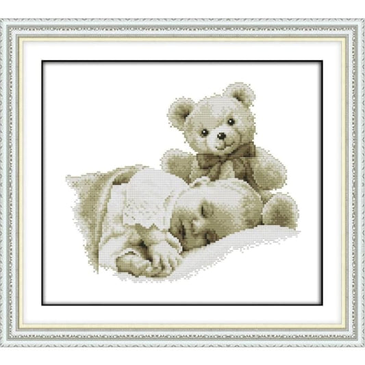 Sleeping boy and doll